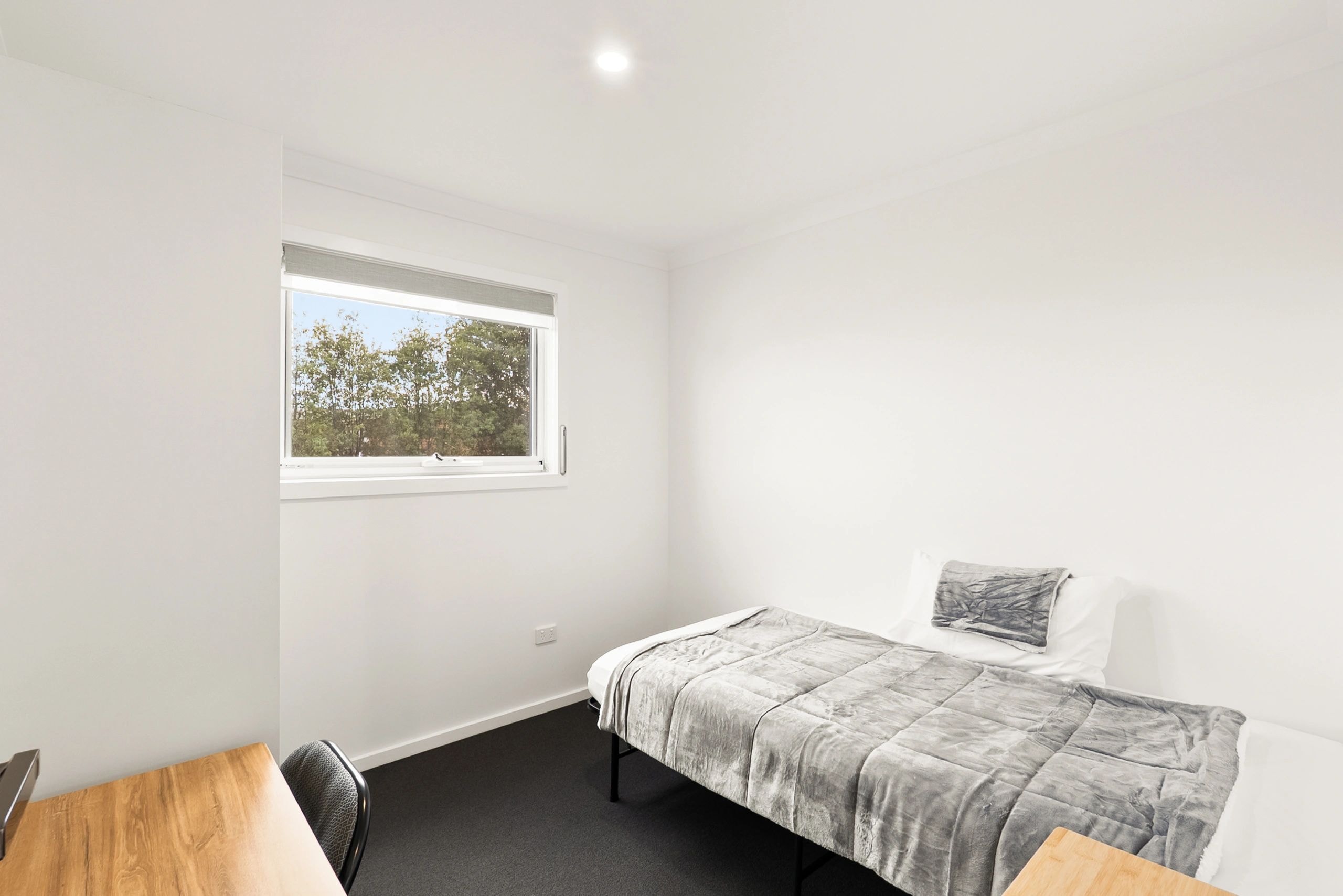 Single bedroom with tree views