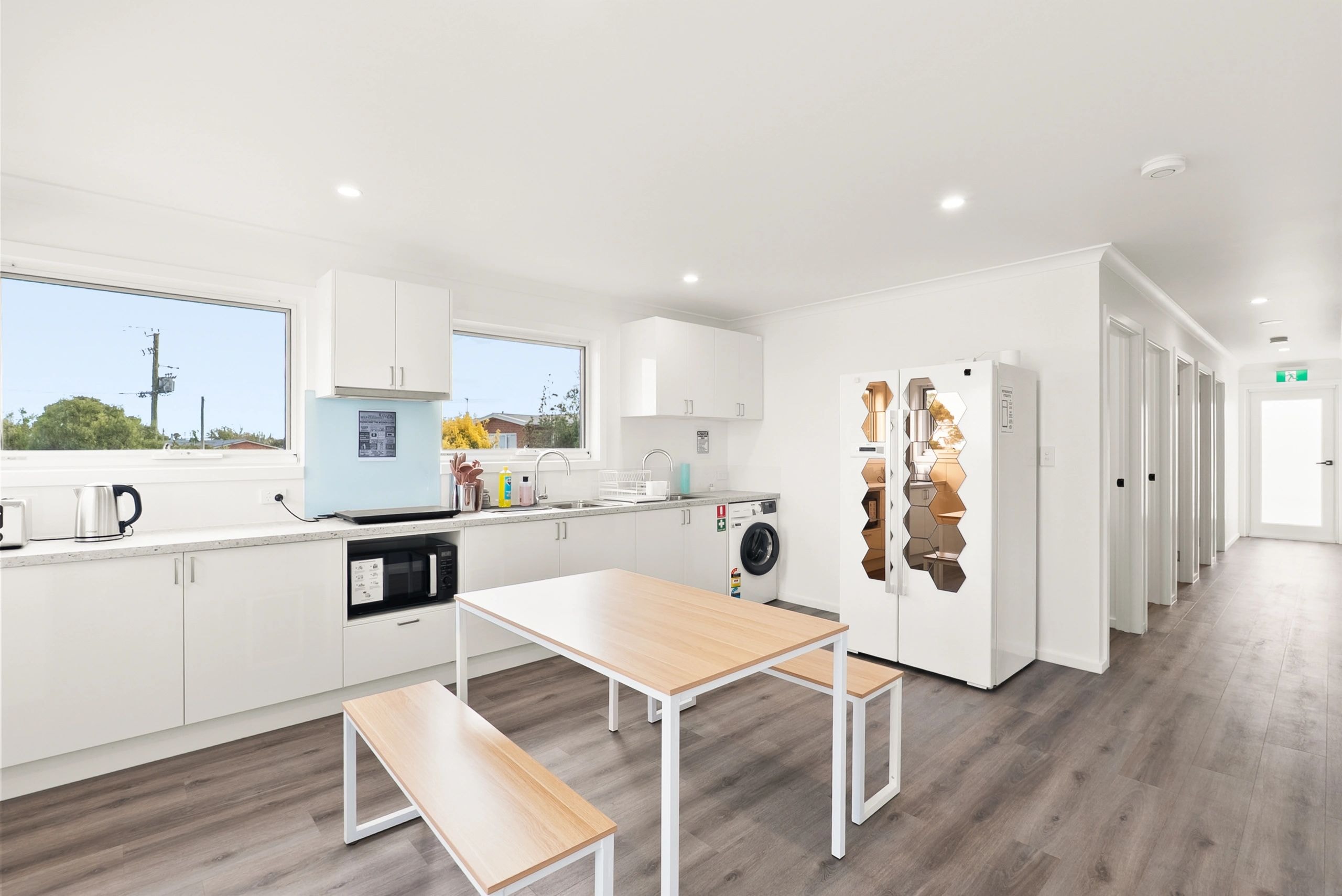 Modern shared kitchen and dining area